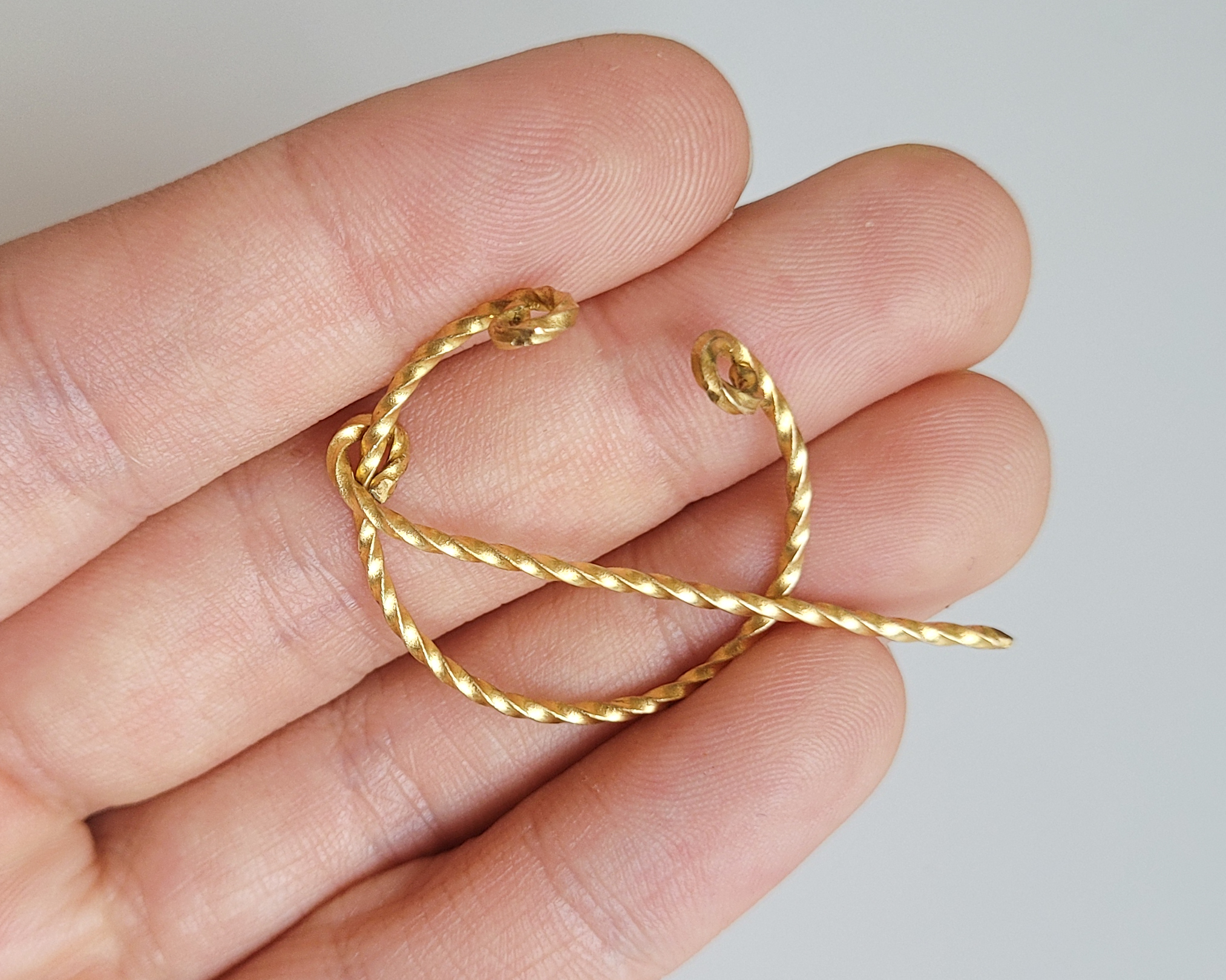 Hufeisenfibel Bronze gedreht