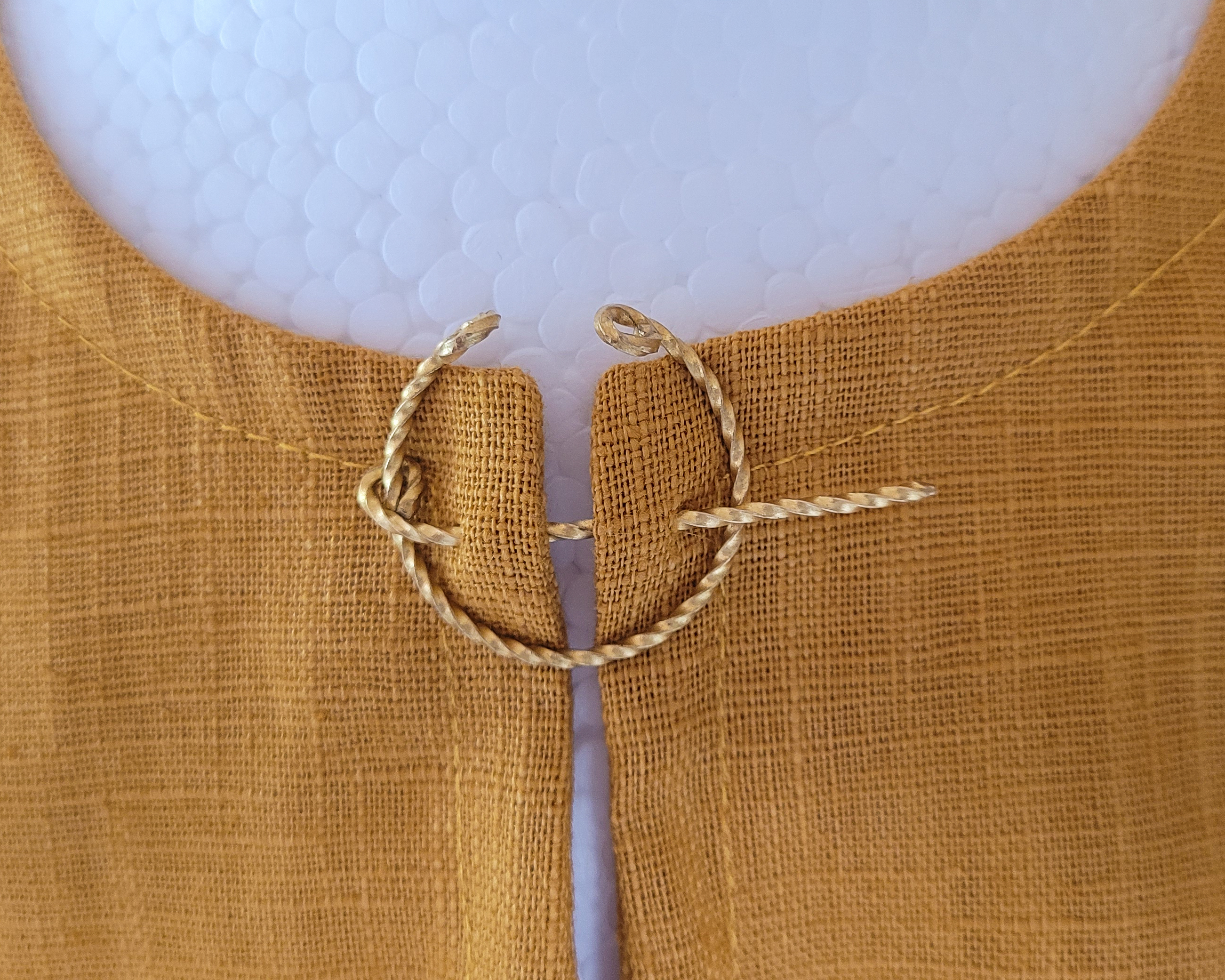 Hufeisenfibel Bronze gedreht